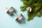 Christmas dumbbells flat lay with balls and pine branches. New Year new you, concept of sport, winter sale season, gym workout and