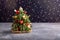 Christmas edible tree made from cheese, vegetables and sprigs of rosemary.  New Year food background, food art concept. Copy space