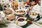 Christmas Eve table with traditional Polish dishes and pastries