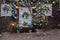 Christmas facade of a wooden house with Christmas trees, wreath, garlands.Snowy courtyard