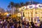 Christmas fair with carousel on Modernisme Plaza of the City Hall of Valencia, Spain.