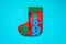 Christmas felt Santa boot with snowman. Creative felt application projects for kids. Fun educational activities for children.