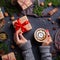 Christmas, female hands with gift boxes and cup of coffee