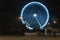 Christmas ferris wheel and iron concrete barriers at Moravian square