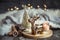 Christmas festive background with toy deer, golden lights and candles, wooden deck table