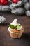 Christmas festive cupcake with holly leaves