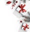 Christmas fir branches with gift boxes with red ribbon on white paper background with bokeh, light. Xmas and New Year