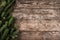 Christmas fir branches on wooden background. Xmas and New Year theme.