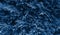 Christmas fir tree branches traditional background in deep classic blue color, toned floral background