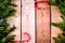 Christmas fir tree frame on old natural damaged wooden background.