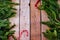 Christmas fir tree frame on old natural damaged wooden background.