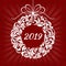 Christmas floral wreath with 2019 on a red background with rays.
