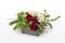 Christmas flower arrangement with red Roses and mixed holiday greens. Professional floristry.