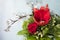 Christmas flower bouquet with amaryllis, rose and glass flowers on branch