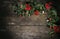 Christmas flowers and pine on weathered wood