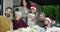 Christmas, food and a family selfie together at a table for a social gathering, celebration event or bonding. Children