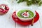 Christmas food healthy idea. Green smoothies decorated with Chri