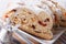 Christmas fruit cake Stollen sliced macro horizontal