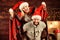 Christmas fun. Interesting ideas celebration. Man and woman santa claus hats cheerful celebrating new year. Merry