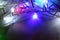 Christmas garland with bulbs and lights, Christmas, colored small lights close up