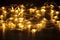 Christmas garland in the form of bulbs of stars lying on the floor. Many lights