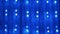 Christmas Garland of Many Blinking, Flickering Blue LED Lights on Curtain. Zoom