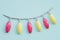 Christmas garland with red and yellow bulbs, 3d render