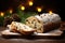 Christmas German Stollen with dry fruits on wooden board. Traditional treats