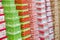 Christmas gift boxes standing in rows. Background texture of gifts