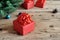 Christmas gift closeup on wooden table