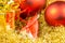 Christmas gift, heart and balls on gloden background