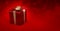 Christmas gift packs with elegant and luxurious red metallic paper and golden shimmering bow on red background