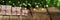 Christmas gifts, on old wooden table, bokeh lights