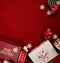 Christmas gifts presents on red background. Simple, classic red and white wrapped gift boxes with ribbon