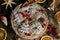 Christmas gingerbread cookies in a round wicker basket, top view