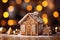 Christmas Gingerbread house on the background of golden festive bokeh.Christmas baking.Holiday mood