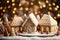 Christmas Gingerbread house on the background of golden festive bokeh.Christmas baking.Holiday mood