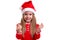 Christmas girl clenching the fists, wearing a santa costume, isolated over a white background