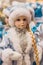 Christmas girl dolls, snow maiden for presesents or decoration, carry gifts sale, market, realization in the shop