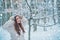 Christmas girl outdoor portrait. Girl in snow. women on mountain. Winter emotion. Images for winter. Global cooling.