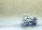 Christmas glitter background, three silver pine cone