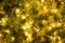 Christmas glod ball on the branches fir glowing garland , Christmas or New Year`s background.