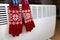 Christmas gloves on a radiator in a cold winter day, energy crisis, power saving