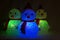 Christmas Glowing Snowman. Holiday Time Light-up.