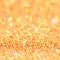 Christmas gold blinking background. Bokeh and Stars