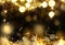 Christmas Gold glowing Background. Golden Holiday Abstract Glitter Defocused Backdrop With Blinking Stars and garlands