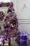 Christmas Golden dragonfly tree with colorful decorations and gifts in the decorative interior for the holiday