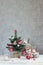 Christmas gray background with candles and tree