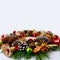 Christmas greeting background with red ornaments decorated wreath