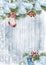 Christmas greeting card with christmas stockings, gingerbread and snowy branches